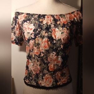 i. on Floral Top